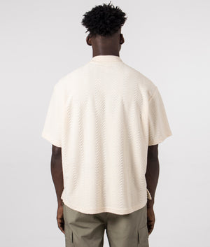 Zen Terry Boxy Polo in Off White by Pleasures. EQVVS Model Shot.