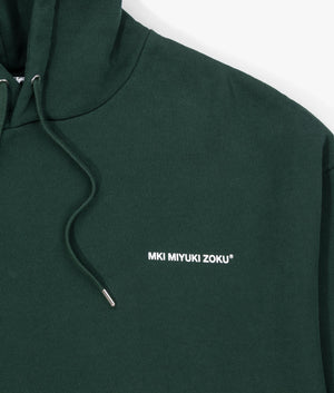 Oversized Uniform Hoodie in Green from MKI MIYUKI ZOKU. Detail shot at EQVVS.