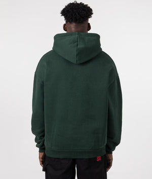 Oversized Uniform Hoodie in Green from MKI MIYUKI ZOKU. Back model shot at EQVVS.