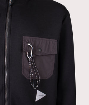 and wander Airly Full Zip Sweatshirt in black. Shot at EQVVS.  Detail shot. 
