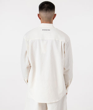 MKI Oversized Seersucker Dress Shirt in Off White. Back angle model shot at EQVVS.