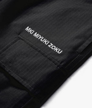 Relaxed Fit Ripstop Cargo Pants in Black by MKI MIYUKI ZOKU. EQVVS Detail Shot.