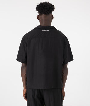 Oversized Tencel Vacation Shirt in Black by MKI MIYUKI ZOKU. EQVVS Back Model Shot.