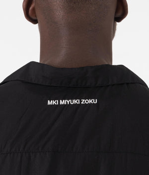 Oversized Tencel Vacation Shirt in Black by MKI MIYUKI ZOKU. EQVVS Model Detail Shot.