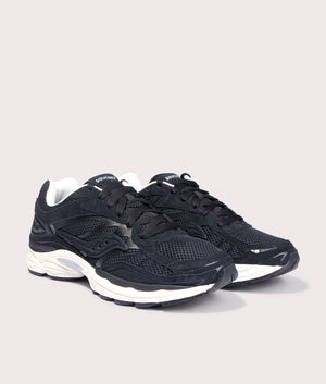 Progrid Omni 9 Sneakers in Black and Cream by Saucony at EQVVS. Front Pair Shot. 