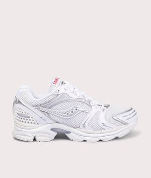 Saucony ProGrid Triumph 4 Sneakers White/Silver. Shot at EQVVS. Side angle. 