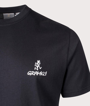 Gramicci One Point Logo Tee in Black at EQVVS. Detailed logo shot.