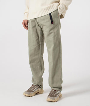 Gramicci Pigment Dye Pants in Pigment Sage Green, with integrated nylon belt, 100% cotton at EQVVS menswear. Side shot.