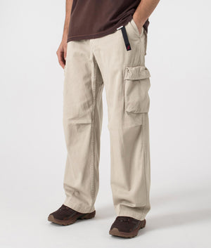 Gramicci Rig Cargo Pants in Pigment Oat with elasticated belt, 100% cotton. At EQVVS Menswear, side shot. 