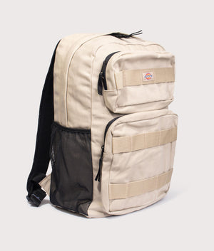 Dickies Dickies Duck Canvas Utility Backpack in Desert Sand. Side angle shot at EQVVS.