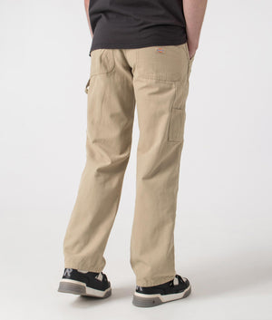 Dickies Canvas Carpenter Lighweight Trousers in Desert Sand. Shot at EQVVS.  Back angle shot. 