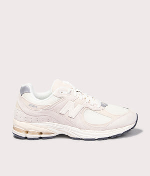 New Balance 2002R Sneakers in Calm Taupe. Side angle shot at EQVVS.