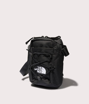 The North Face Jester Crossbody Bag in Black at EQVVS. Angle Shot.