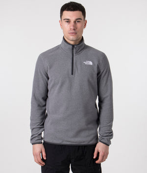 The North Face Quarter Zip 100 Glacier Fleece in Medium Grey Heather. Shot at EQVVS.  Front shot model. 