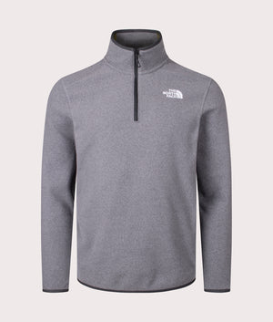 The North Face Quarter Zip 100 Glacier Fleece in Medium Grey Heather. Shot at EQVVS. Front shot mannequin. 