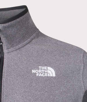 The North Face Quarter Zip 100 Glacier Fleece in Medium Grey Heather. Shot at EQVVS. Detail shot mannequin. 