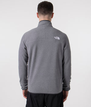 The North Face Quarter Zip 100 Glacier Fleece in Medium Grey Heather. Shot at EQVVS. Back shot model. 