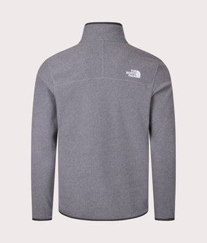 The North Face Quarter Zip 100 Glacier Fleece in Medium Grey Heather. Shot at EQVVS.  Back shot mannequin. 