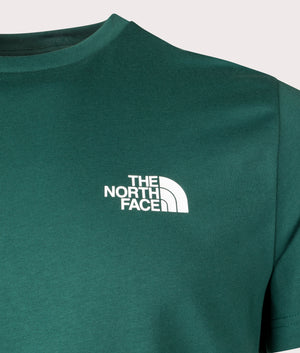 The North Face Simple Dome T-Shirt in Deep Nori Green at EQVVS. Chest detail Shot.