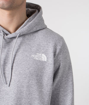 The North Face Simple Dome Hoodie in Grey Heather. Shot at EQVVS.  Model detail shot. 