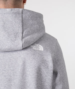 The North Face Simple Dome Hoodie in Grey Heather. Shot at EQVVS.  Model detail shot. 