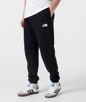 The North Face Simple Dome Light Tapered Joggers in Black. Shot at EQVVS. Side shot. 