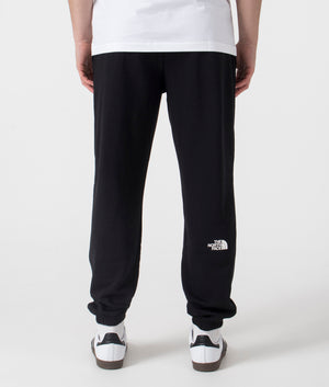 The North Face Simple Dome Light Tapered Joggers in Black. Shot at EQVVS. Back shot. 