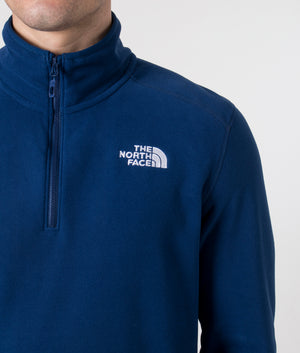 The North Face Quarter Zip 100 Glacier Fleece in Estate Blue. Shot at EQVVS. Detail model shot. 