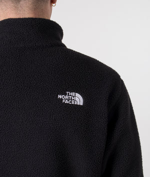 The North Face TNF Quarter Zip Fleeski in Black. Shot at EQVVS. Detail model shot. 