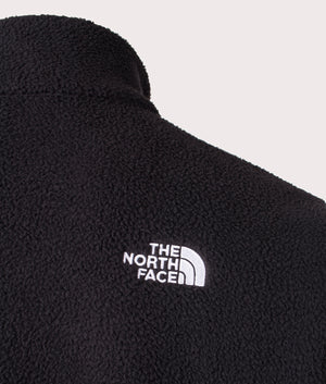 The North Face TNF Quarter Zip Fleeski in Black. Shot at EQVVS. Detail shot mannequin. 