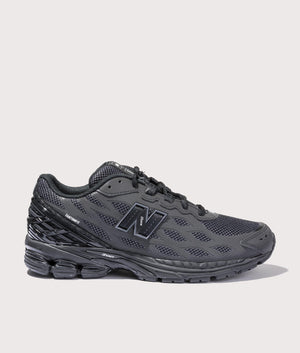 New Balance 1906W Reflective Sneakers in Black. Shot at EQVVS.  Side angle. 