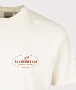 Gramicci Climbing Equipment T-Shirt in Natural Pigment, 100% cotton at EQVVS. Detailed Logo Shot. 