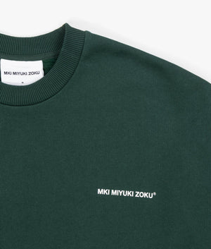 Oversized Uniform Crewneck Sweatshirt in Green from MKI MIYUKI ZOKU. Detail shot at EQVVS.