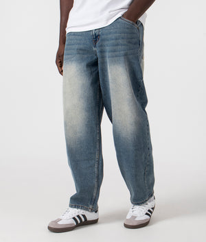 Dime MTL Classic Baggy Denim Pants in Sandblasted Indigo. Shot at EQVVS. Side angle shot. 