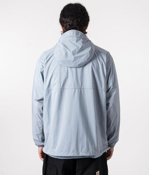 Nylon pertex jacket in light blue by and wander. shot at EQVVS. Reverse shot. 
