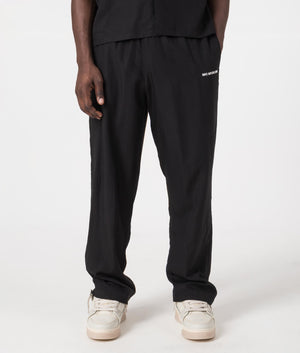 MKI Relaxed Fit Tencel Trousers in Black. Front angle model shot at EQVVS.