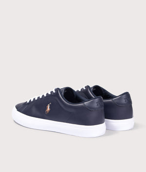 Polo Ralph Lauren Longwood Leather Low Top Sneakers in Hunter Navy. Back angle shot at EQVVS.