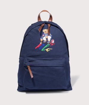 Polo Ralph Lauren Polo Bear Canvas Backpack in Newport Navy. Front angle shot at EQVVS.