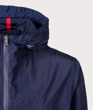 Polo Ralph Lauren Full-Zip Hooded Windbreaker in Newport Navy at EQVVS. Detailed Logo Shot. 