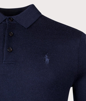 100% Wool Knitted Polo Shirt in Hunter Navy. Detail angle shot at EQVVS.