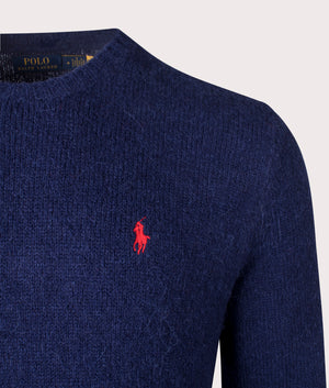 Polo Ralph Lauren Textured Crewneck Jumper in Bright Navy, 42% Wool, 38% Alpaca hair, 20% Recycled Nylon at EQVVS. Detailed Logo Shot. 