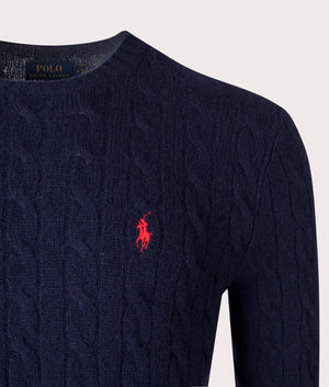 Polo Ralph Lauren Cashmere Blend Cable Knit Jumper in Hunter Navy, 90% Wool, 10% Cashmere at EQVVS. Detailed logo shot. 