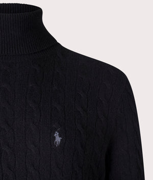 Polo Ralph Lauren Cable Wool-Cashmere Turtleneck Jumper in Polo Black at EQVVS. Detailed Logo Shot. 