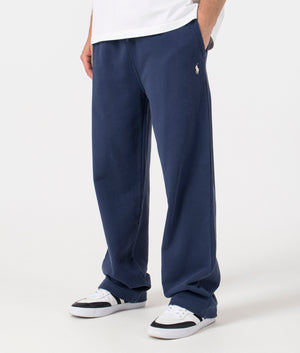 Polo Ralph Lauren Loopback Fleece Drawstring Joggers in Cruise Navy. Side angle model shot at EQVVS.