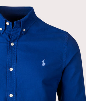 Polo Ralph Lauren Slim Fit Garment-Dyed Oxford Shirt in Chalet Blue. Shot at EQVVS. Detail shot. 