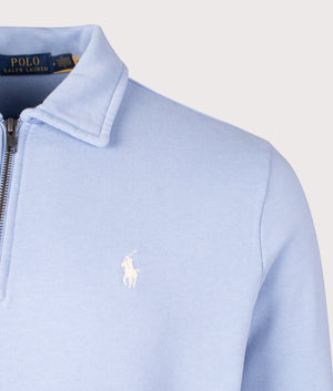 Polo Ralph Lauren Quarter Zip Loopback Terry Sweatshirt in Chambray Blue, 100% cotton at EQVVS. Detailed logo shot. 