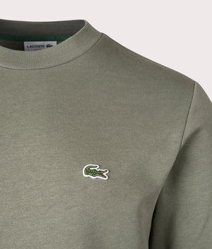 Relaxed Fit Organic Brushed Cotton Sweatshirt in Khaki Green by Lacoste. EQVVS Detail Shot.