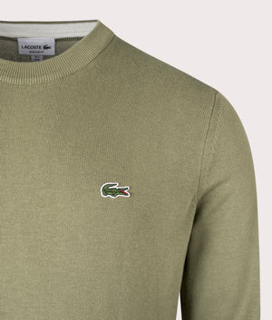 Lacoste Croc Logo Knitted Jumper in Khaki. Detail angle shot at EQVVS.