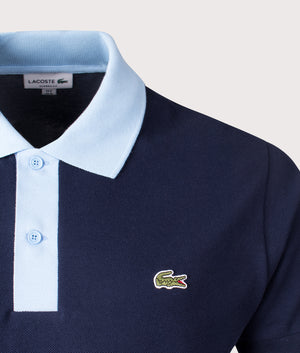 Lacoste Ribbed Collar Polo Shirt in Navy Blue. Shot at EQVVS.  Detail shot. 