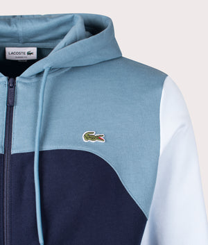 Lacoste Colour-Block Hoodie in Navy and Limestone Blue. Detail Shot at EQVVS.